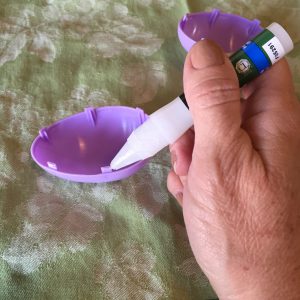 Glue Plastic Egg Together.